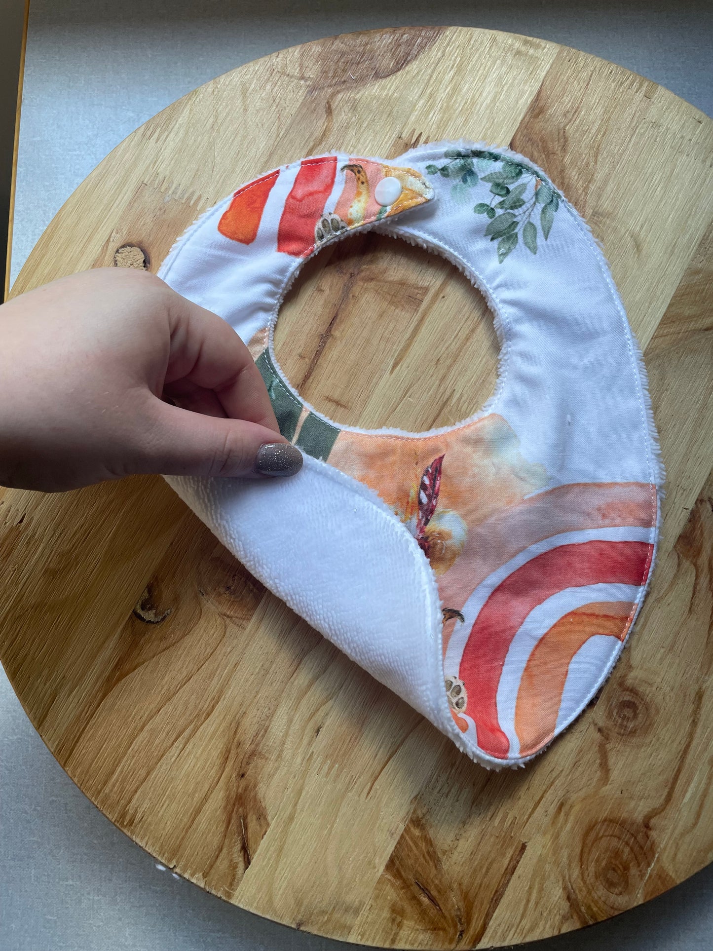 🟢 Bavoir lionceau indien