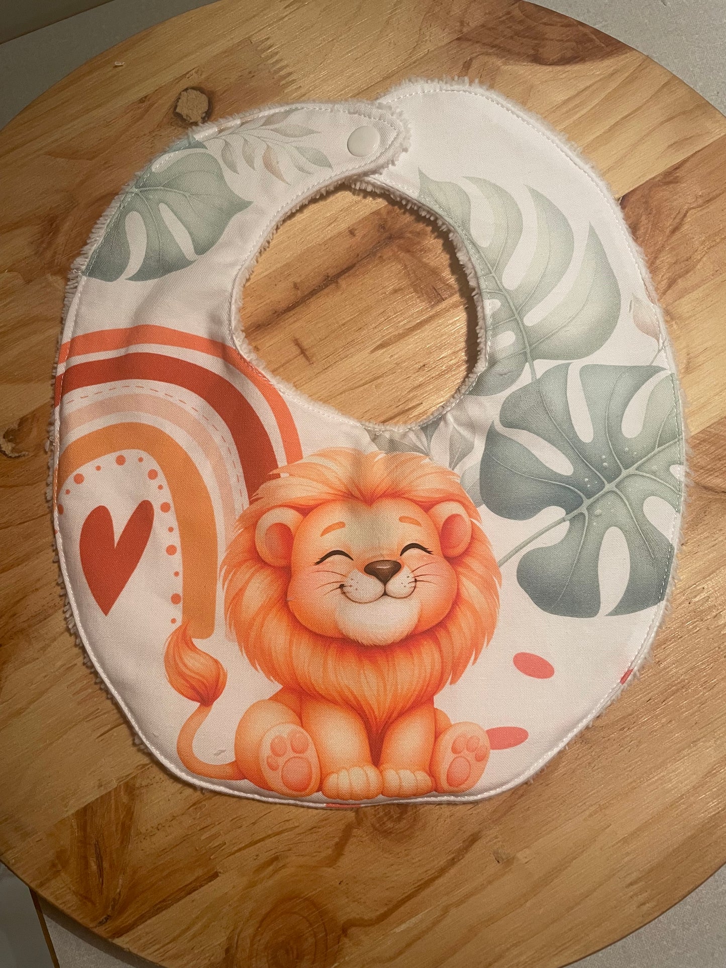 🟢 Bavoir lion rainbow